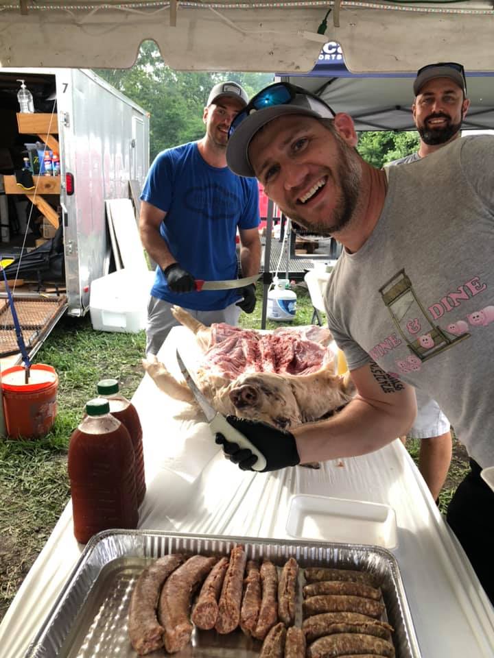 swine and dine team preparing their food