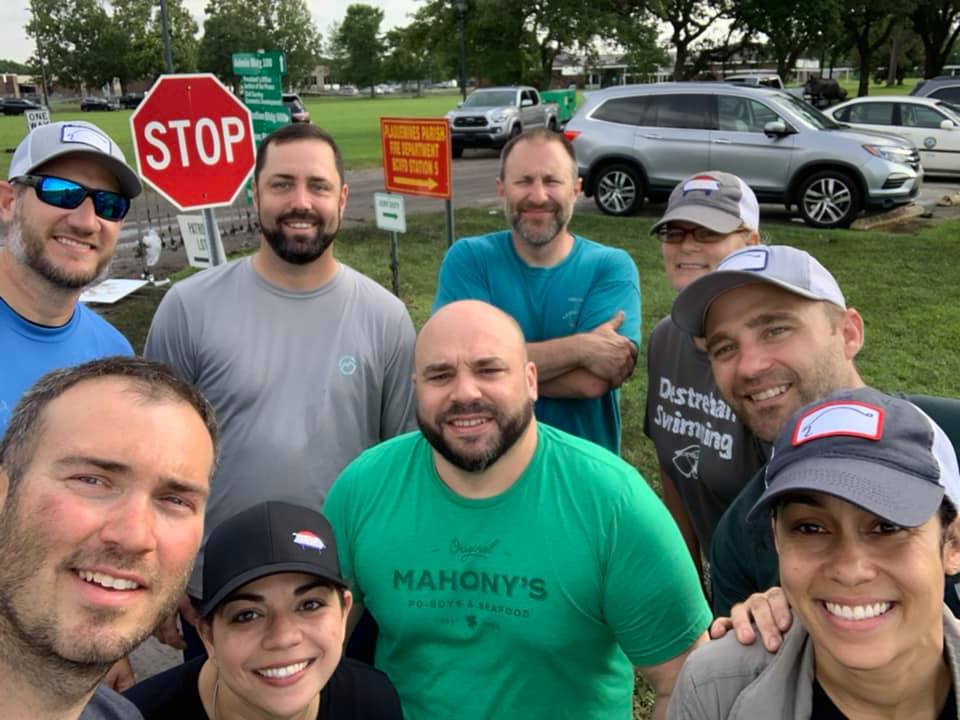 full swine and dine team group selfie at hogs fest