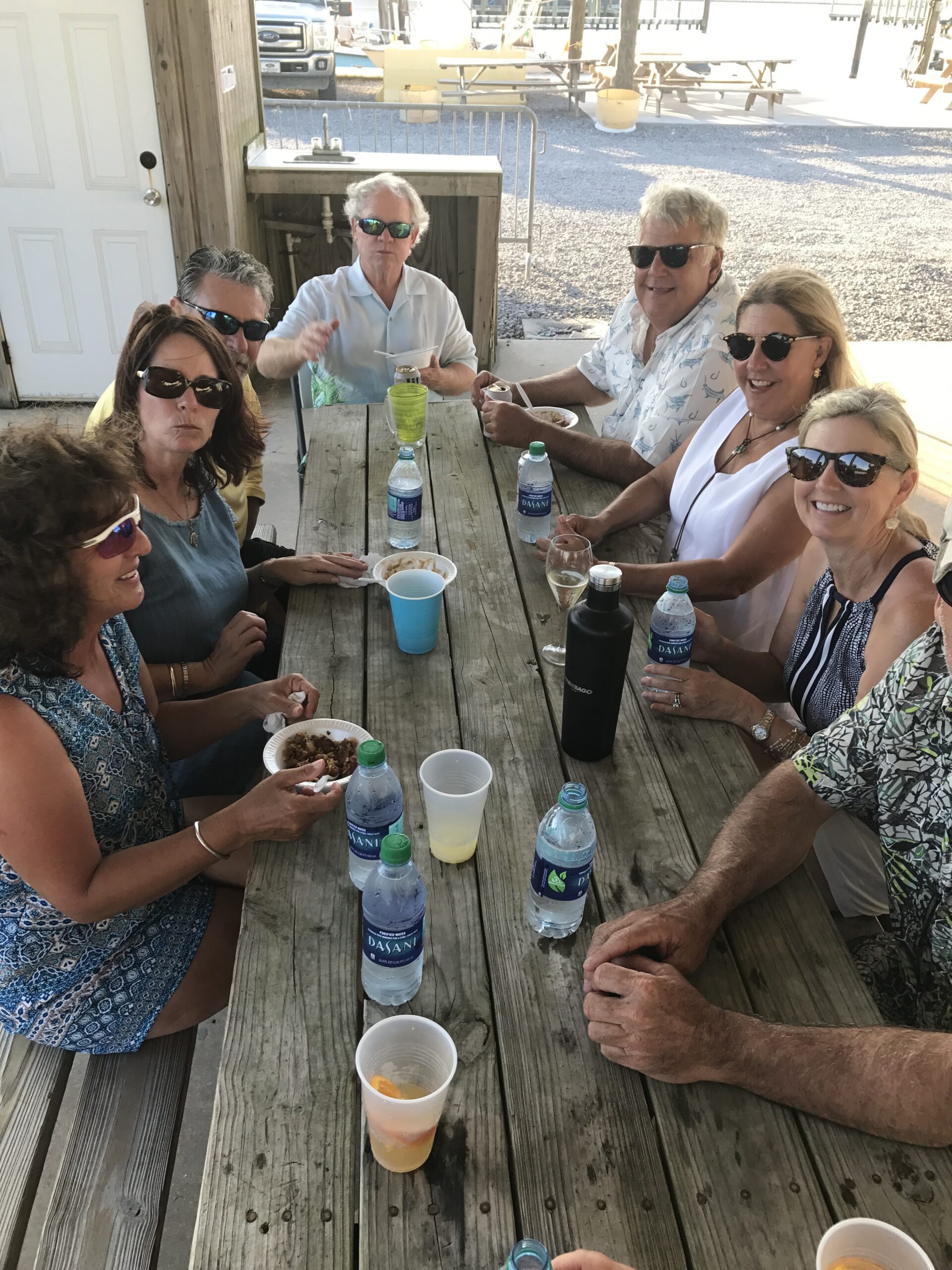 group photograph at a picnic table of grand isle slam participants