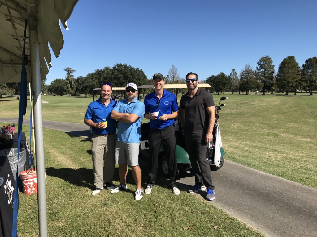 golf classic group photo as they are about to begin the tournament