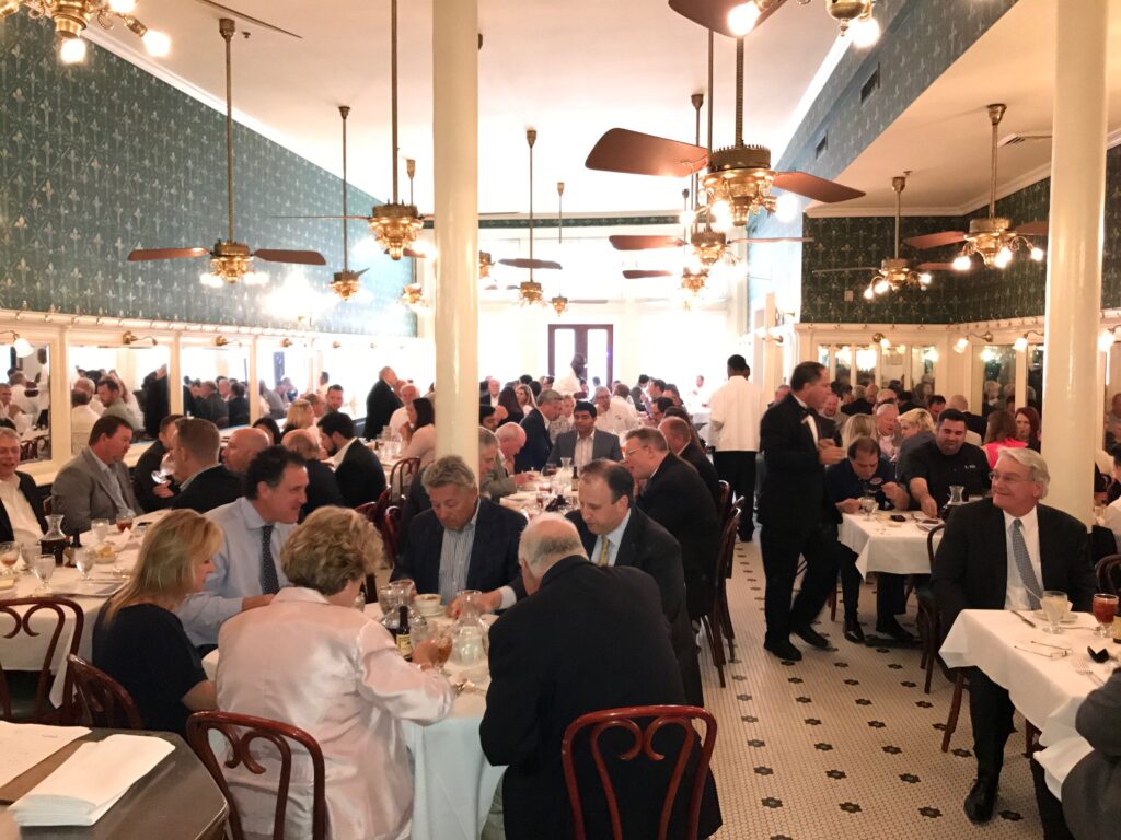 full shot of the guests at gaslatoire's restaurant during the jazz luncheon