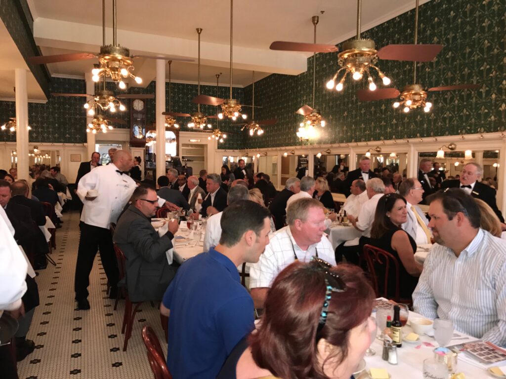 full shot of the guests at gaslatoire's restaurant during the jazz luncheon 3